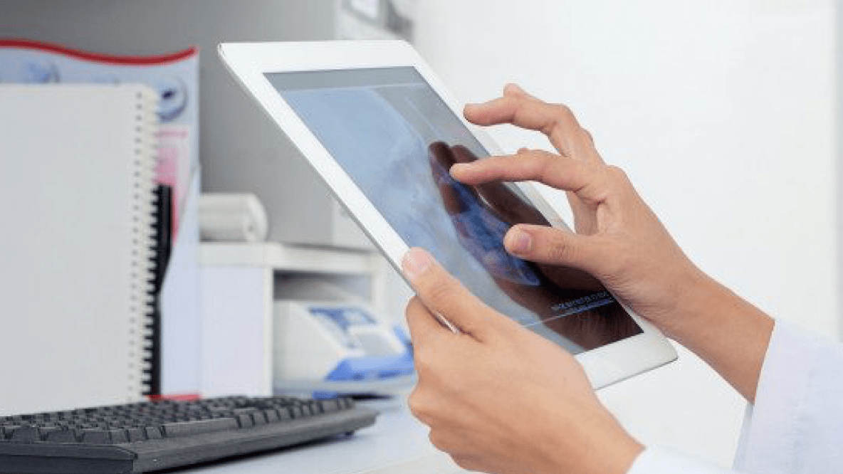 doctor working on a tablet